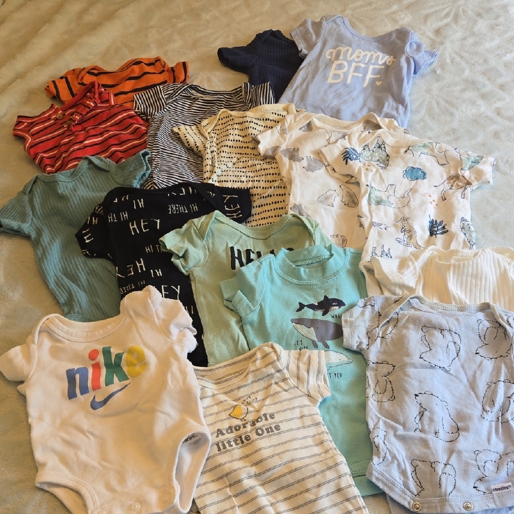 Assorted Newborn Clothes.